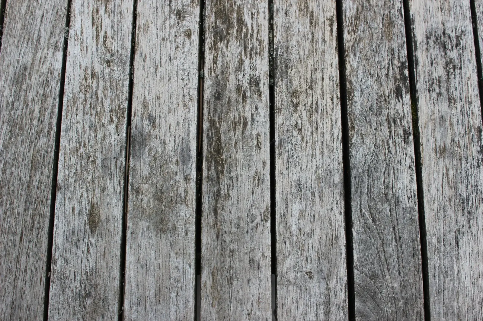 Weathered gray wooden deck boards